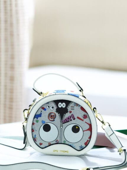 Sac bandoulière rond design ludique